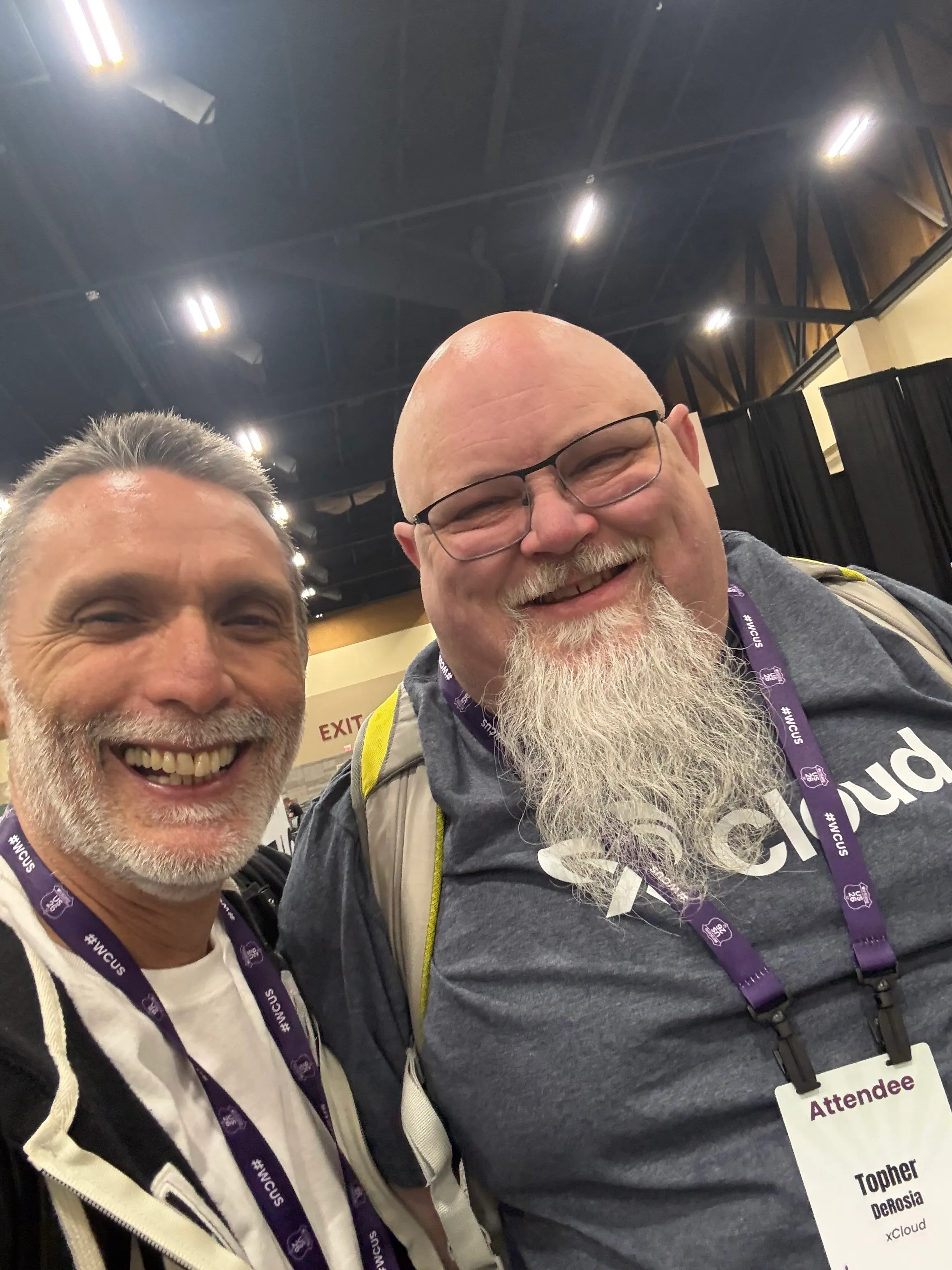Alfredo Navas taking a selfie with former coworker and HeroPress founder Topher DeRosia at WordCamp US 2026.