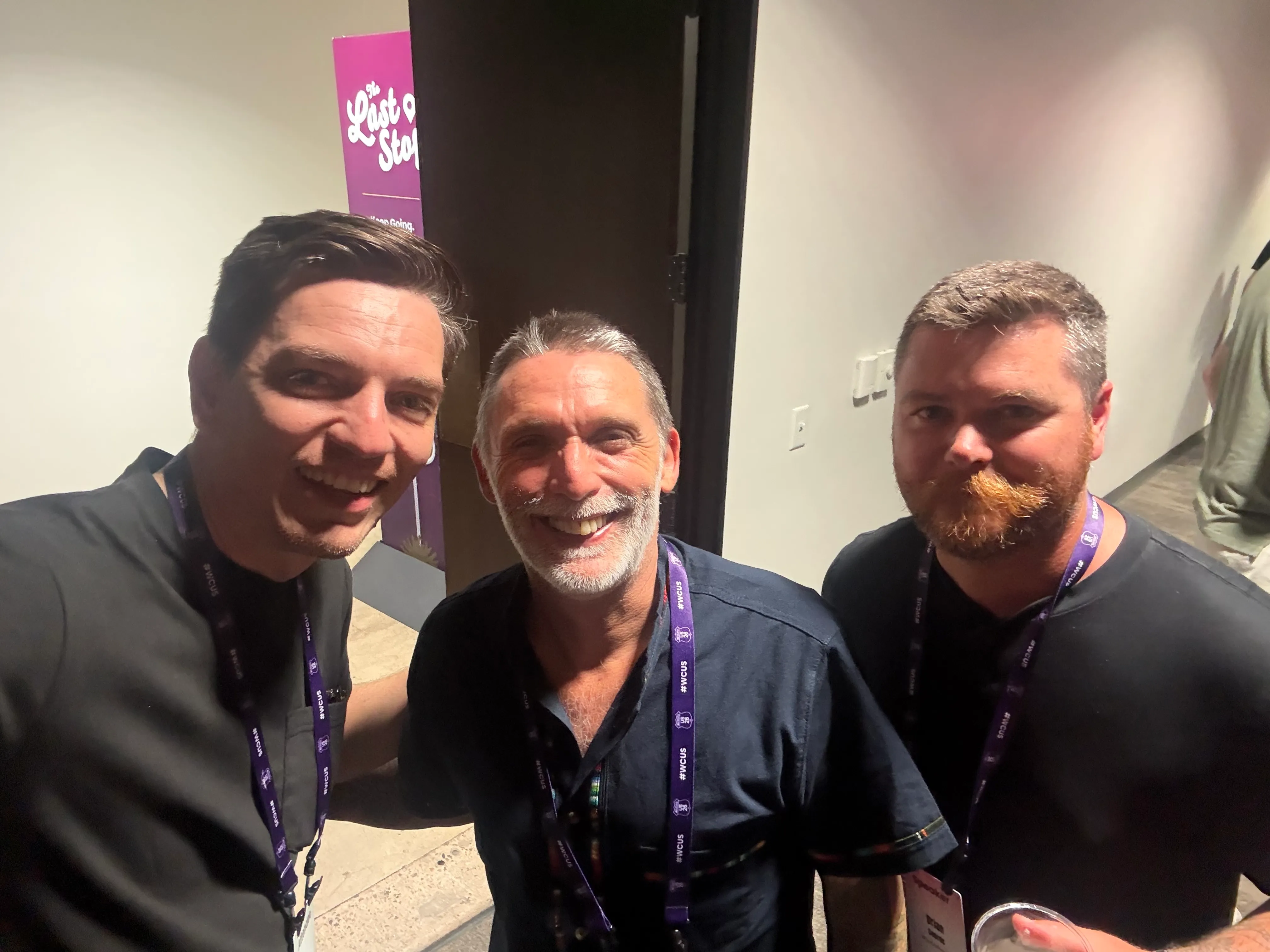 Alfredo Navas with Mike McAllister of Ollie and Brian Coords of Woo at WordCamp US 2026.